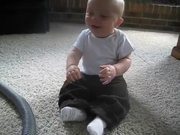 Baby Laughing At The Vacuum