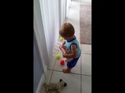 Toddler Struggles To Pick Up Balls