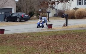 Large Man Driving A Mini Bike - Fun - VIDEOTIME.COM