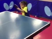 Little Girl Playing Table Tennis Like A Pro