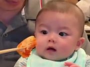 Toddler Reacting To Delicious Looking Food