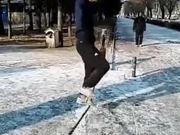 A Man Balances Himself On The Rope