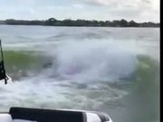 Kayaking On The Waves Generated By A Motorboat