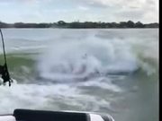 Kayaking On The Waves Generated By A Motorboat