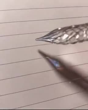 Writing Using A Glass Tipped Pen
