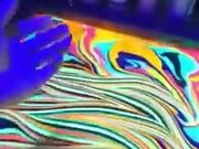 Dipping Arm In Psychedelic Paint