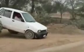 A Tiny Hatchback With Two Tractor Wheels? - Tech - VIDEOTIME.COM