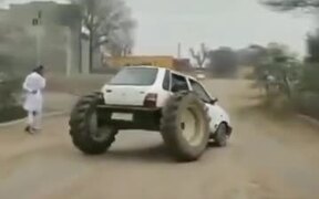 A Tiny Hatchback With Two Tractor Wheels? - Tech - VIDEOTIME.COM