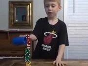 Little Kid Stacking 20 Dices