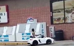 Man In A Children's Electric Car - Fun - VIDEOTIME.COM