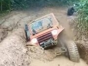 Jeep Trapped In The Mud Getting Free