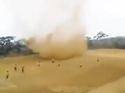 Indonesian Students Chasing A Sand Storm
