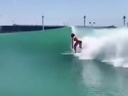 Surfer Enjoying An Artificial Wave