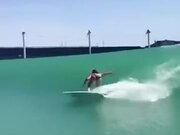 Surfer Enjoying An Artificial Wave