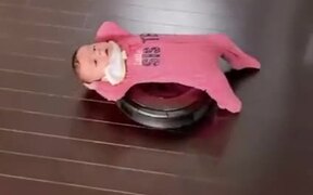 Toddler Enjoying A Ride On A Vacuum Cleaner - Kids - VIDEOTIME.COM