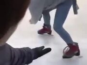 Amateur Girl Trying To Stand On Ice Wearing Skates