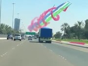 Colorful Airplane Smokes Drawing The Sky