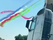 Colorful Airplane Smokes Drawing The Sky