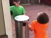 Two Little Boys Bonking Each Other On Their Heads