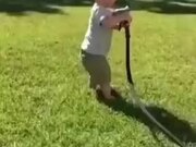 Little Boy Learned Of Garden Hose