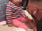 Baby Boy Plays With His Father