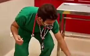 Doctor Dances With Puppy Before Giving A Vaccine - Animals - VIDEOTIME.COM