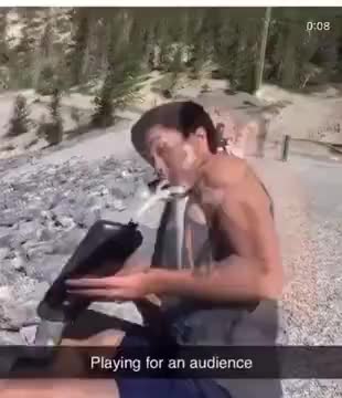 Marmot Watches Guy Play A Melodica