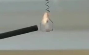 Cool Physics Experiment With A Candle And A Spring - Tech - VIDEOTIME.COM