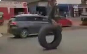 When Your Only Form Of Transport Is A Truck's Tire - Fun - VIDEOTIME.COM