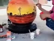 Cool Painting On A Sidewalk Stone Sphere