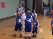 Kid Helps A Brother With Scoring Basketball Goal