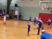 Kid Helps A Brother With Scoring Basketball Goal