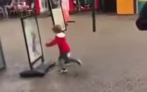 Kid From Denmark Has Some Fun With A Signboard - Kids - VIDEOTIME.COM