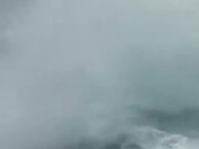 Massive Whale Breaches Near Ship