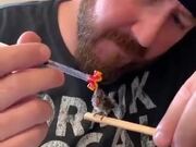 Man Takes Feeds A Tiny Baby Hummingbird