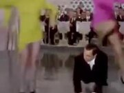 Gene Kelly Being Leaped Over By Women