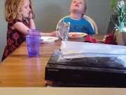 Amazing Sister Helps Feed Brother