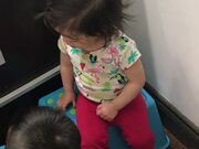 Big Brother Helps Little Sister Brush Teeth