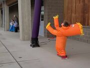 Kid Wears Inflatable Doll Costume And Dances