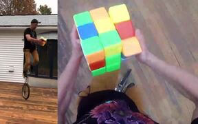 Person Solves Giant Rubik's Cube On Unicycle - Fun - VIDEOTIME.COM
