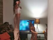 Circus Performer Lifts and Balances People and Dog