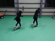 Sisters Perform Synchronized Tricks On Skateboard