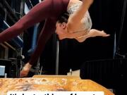 Circus Artist Practices Dangerous Contortion Stunt