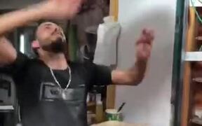Person Demonstrates Unique Dough Tossing Skills