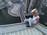 Man Performs Some High-Rise Stunts