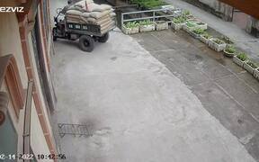 Man Transporting Heavy Load Falls Through Concrete - Fun - VIDEOTIME.COM