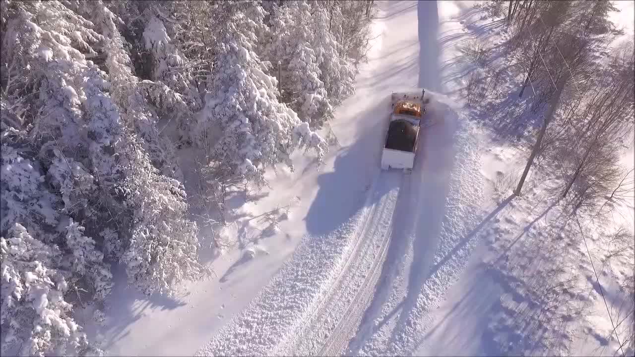 Snowplow Clears Deep Heavy Snow After Storm