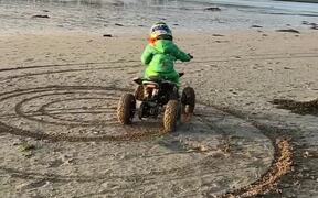 Electric Quad Spinning Donuts on the Beach