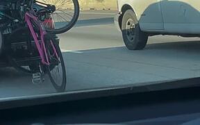 Bicycle Rides Behind Car on Highway - Tech - VIDEOTIME.COM