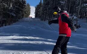 Snowboarder Trying to 50/50 Taco's Around Rail